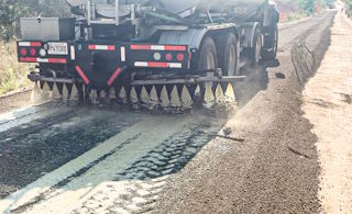 Application with metered spray truck