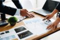 business people reviewing paperwork