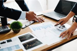 business people reviewing paperwork