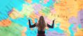 woman from behind looking at a map